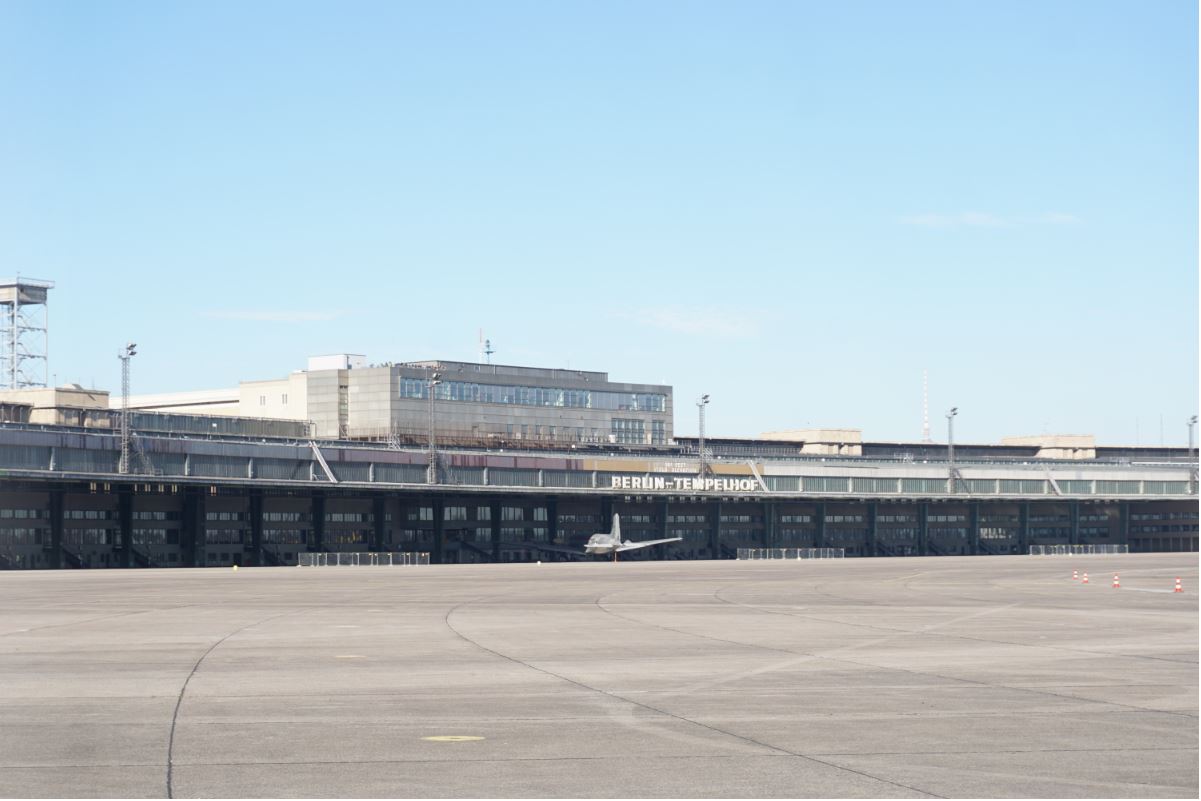 The main building of this airport still stands tall, but there is a fence that prevents the public from approaching the airport hangars